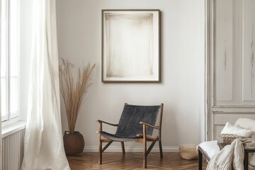 Interior design with abstract art and a modern chair.