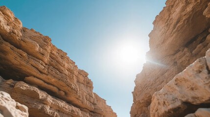 Fototapeta premium Rock formation and sunlight with clear blue sky landscape natural stone scene