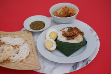 Nasi Uduk with Egg, Sambal, Kerupuk An Indonesian Culinary Delight