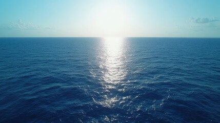 Obraz premium Ocean water surface reflecting sunlight on a bright day scenic seascape