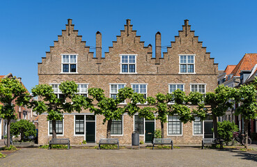 Square with historic stepped gabled houses in the old town of Vlissingen, province of Zeeland, Netherlands