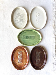 Selection of handmade ceramic pieces, vases, bowls, candleholders, cups and plates