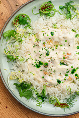 Creamy Risotto with Herbs on White Plate