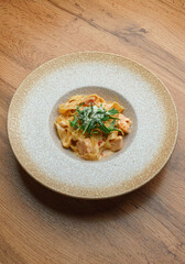 Pasta on round ceramic plate