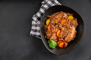Sausage with lentils and vegetables appetizer vegetable dish fresh tasty gourmet food background on the table rustic food top view copy space