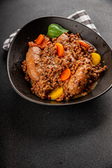 Sausage with lentils and vegetables appetizer vegetable dish fresh tasty gourmet food background on the table rustic food top view copy space