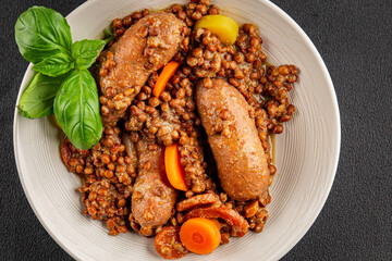 Sausage with lentils and vegetables appetizer vegetable dish fresh tasty gourmet food background on the table rustic food top view copy space