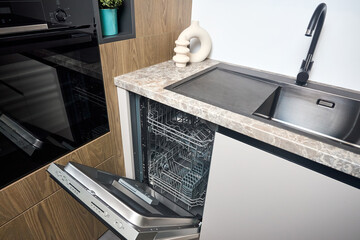 Urban rustic loft style kitchen interior in wooden facade and stoneware countertop tabletop with...