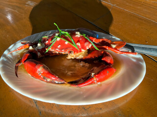 large boiled crab with spices on a plate