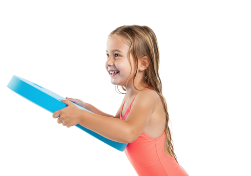 Young girl learning to swim with float board, smiling confidently, on white background