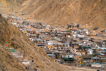 Panoramic view of Leh city in Ladakh, India, nestled in Himalayan mountains, dramatic brown ridges,...