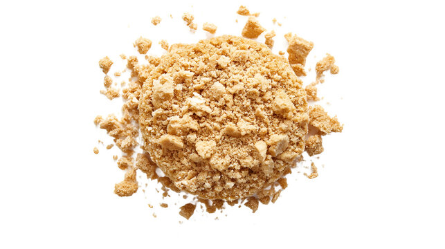Close-up of finely crushed graham cracker crumbs on a white background, highlighting texture and color.