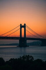 Fototapeta premium arafed view of a bridge with a boat in the water