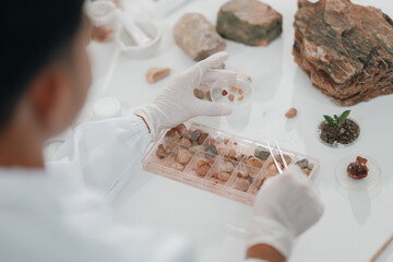 Scientist conducts a blood test in sterile laboratory setting, carefully placing a blood sample on...