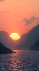 Fototapeta premium Sunset over the sea with mountains in the distance