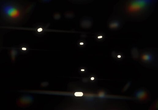 Abstract Particle Light Trail with Holographic Rainbow Refractions Animation. Floating Motion Dots on Dark Background for VJ Loops and Futuristic Design