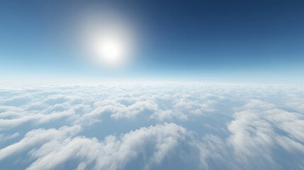 Bird s eye view over a blanket of clouds under a clear blue sky

