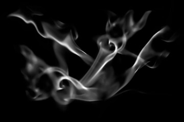 blurred candle smoke over dark background for your abstract design.