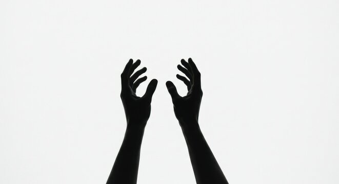 Two dark silhouettes of hands raised upward against a bright white background