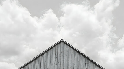 Fototapeta premium A wooden building roof against a cloudy sky background.