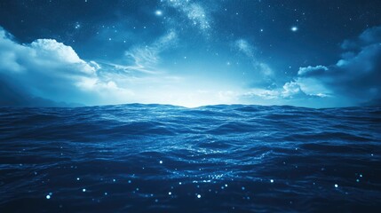 Fototapeta premium Starry night sky over a dark, wavy ocean.