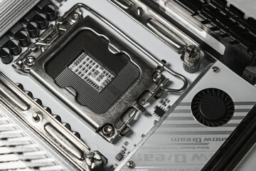 High-resolution macro image showing a close-up view of an empty CPU socket on a modern computer...