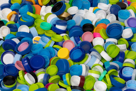 Pile of colorful plastic bottle caps 