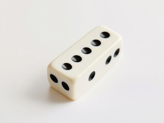 Single Elongated Dice on White Background
