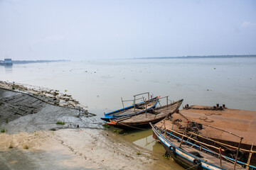 Scenic Gnaga riverbank View with Wooden Boats