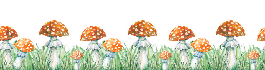Seamless horizontal border with hand-painted watercolor fly agarics. Botanical illustration of poisonous forest mushrooms in green grass. Isolated. For website design, packaging, invitations