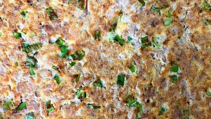 Crispy scallion pancake mosaic, celebrating Asian Lunar New Year, fusion street food art, vibrant...