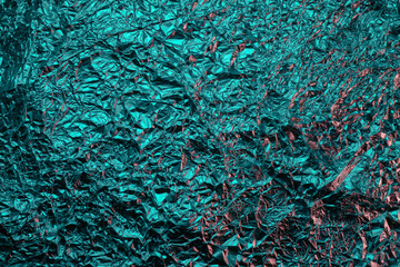 green shiny aluminum foil texture close up
