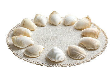 A serene circle of white seashells rests gracefully on a woven doily evoking coastal peace and on transparent background