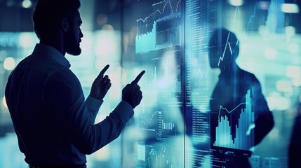 Data Analysis: Businessman reviewing financial data on a large interactive screen.