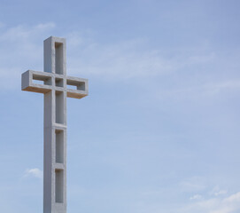 The Mt. Soledad Cross against the blue sky with text space on the side.