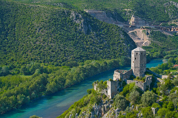 Old town of Pocitelj with view on the tower and river