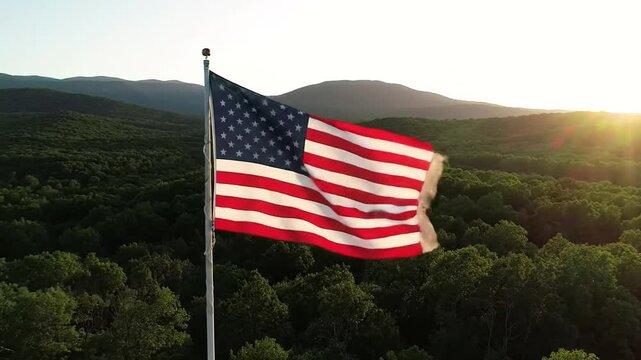 American flag waving over scenic landscape