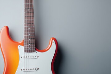 minimalistic electric guitar detail against solid neutral background