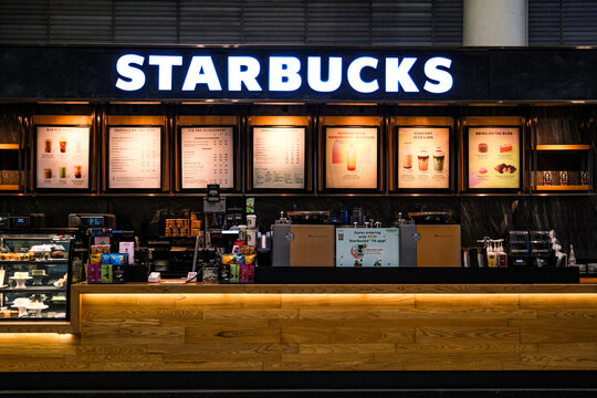 Bangkok,Thailand - May 3, 2023 : Starbucks coffee store brand logo sign, Starbucks Corporation is world's largest coffeehouse chain, trading in Nasdaq stock exchange..