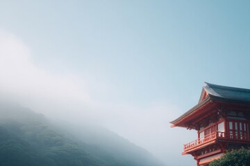 red temple shrouded in mist under clear sky traditional architecture blending effortlessly with natural landscape