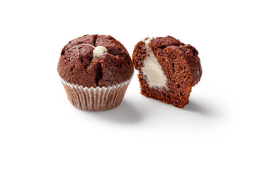 Delicious chocolate muffins with cream filling isolated on white background