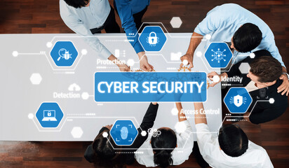 A diverse team collaborates on cyber security strategies, featuring digital graphics that emphasize protection and identity management. Ideal for business and tech visuals. Amity