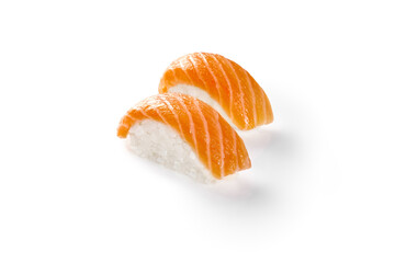 Two nigiri sushi with salmon and rice on white background