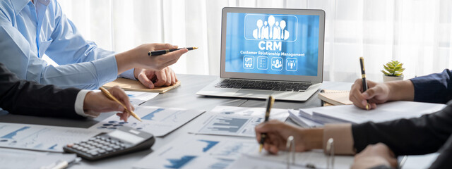 Business intelligence and data analysis concept. Analyst team working on financial data analysis...