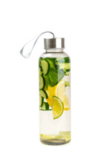 Cucumber water with lemon, lime and mint isolated on white background. Water infused with sliced ​​cucumber in a drinking glass. Tonic refreshing drink. Cucumber lemonade.Summer natural cooling drink