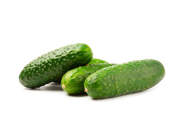 Cucumber isolated on white background. Slice of cucumber on white background. Fresh organic green cucumbers. Vegan. Ingredient for salad. Farm vegetables.