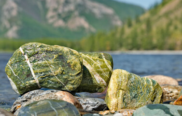 Russia. Western Sayans. Multicolored minerals of unusual beauty in the mountain tributaries of the Tissa River.