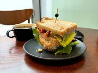 Sandwich with Roasted Pepper, Eggplants, Salad Leaves, Olive Oil, and Cheese on Table. Breakfast Out Concept. Handmade Mobile Photo, Selective Focus, Not AI