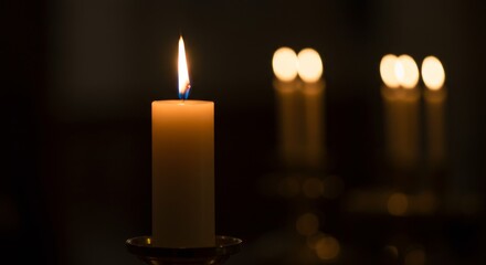 Candlelight creates a calming and reflective atmosphere, illuminating serenity