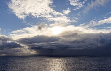 Dramatic Cloudscape Over the Pacific Ocean Under a Bright Sky